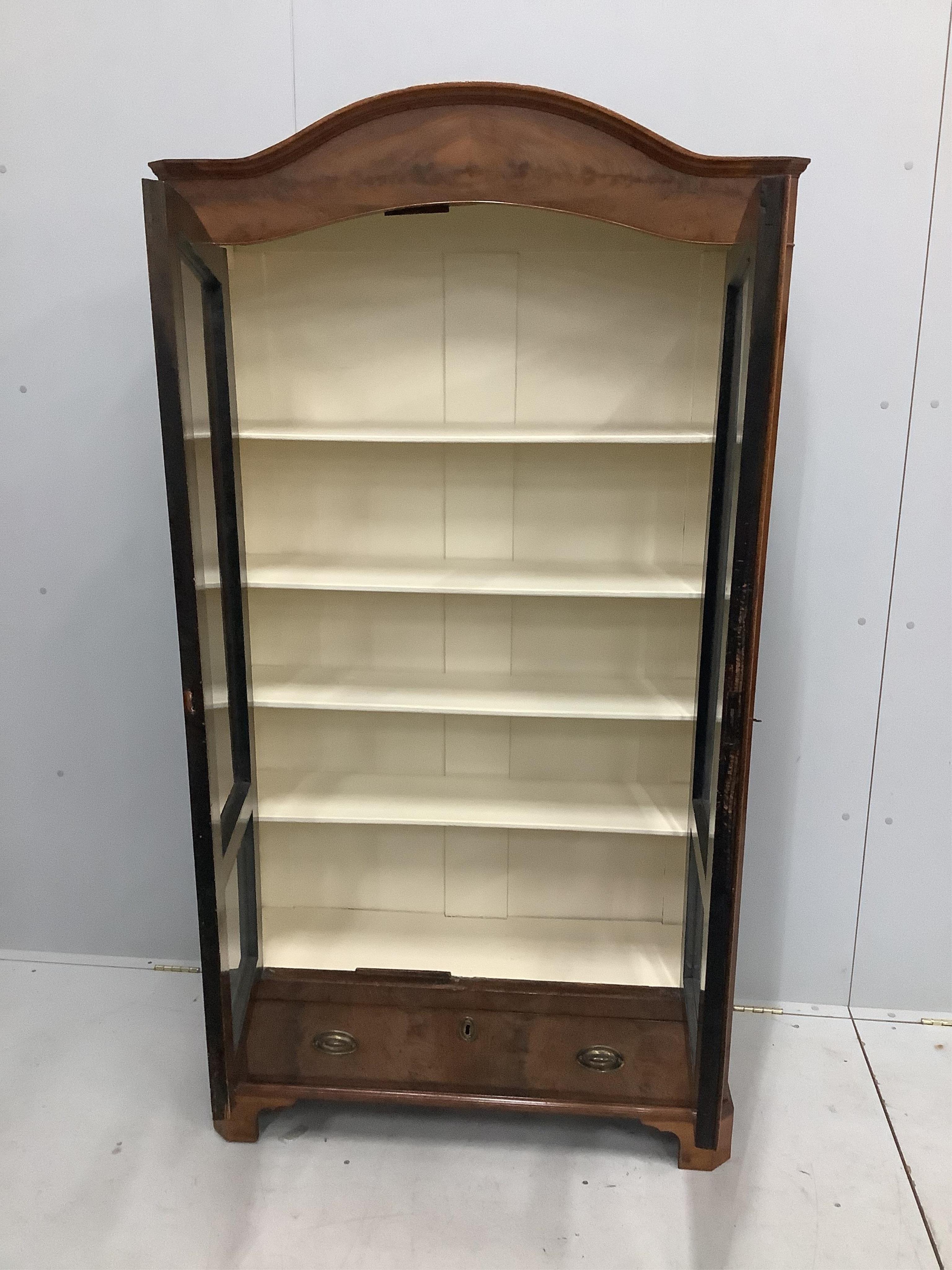 A 19th century German walnut bookcase, width 98cm, depth 31cm, height 181cm. Condition - fair